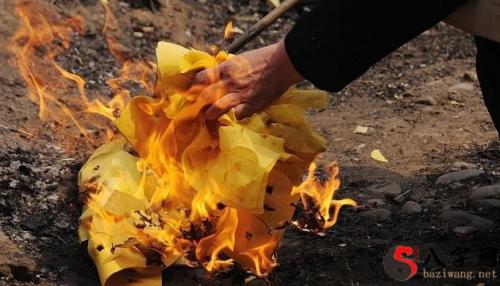 Dreaming of burning paper in mourning clothes